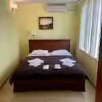 Спальная комната в отдельно стоящем доме на территории парк отеля в Симеиз Лиго Морская