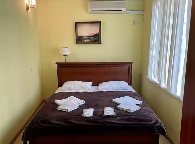 Спальная комната в отдельно стоящем доме на территории парк отеля в Симеиз Лиго Морская